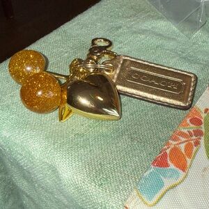 Glitter gold Cherries with heart and coach chain purse charm